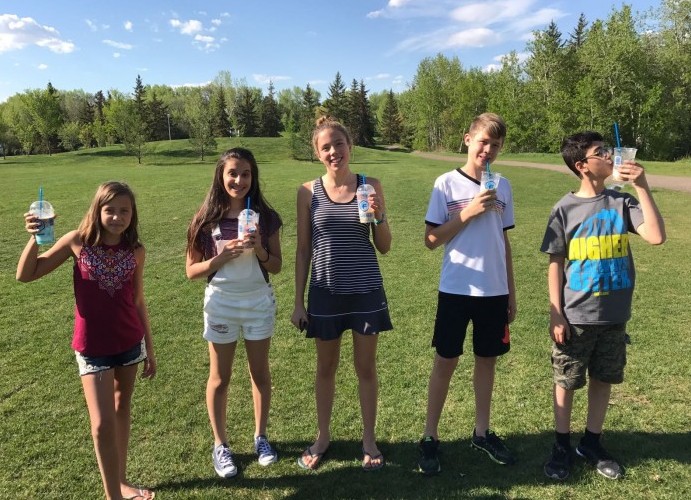 Our long time friends welcomed us back to Canada with slurpees and a barbecue at the local park. 