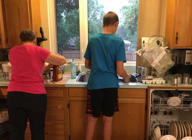 Nate must be on dish duty tonight!  He cleans up every Monday and Tuesday suppers.  (You are welcome future wife of Nate Waldron! :-)   Nan often helps him though!